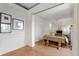 Bright living room showcasing wood floors, neutral paint, elegant molding, and a comfortable seating arrangement at 75 Ponce De Leon Ne Ave # 1006, Atlanta, GA 30308