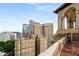 Rooftop view from apartment with ornate architectural detail and city views at 75 Ponce De Leon Ne Ave # 1006, Atlanta, GA 30308