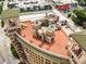 Stunning rooftop view with charming outdoor seating and unique architectural details in an urban setting at 75 Ponce De Leon Ne Ave # 1006, Atlanta, GA 30308