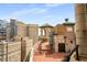 Expansive rooftop terrace offering breathtaking city views with ornate railings and space for outdoor seating, perfect for relaxing at 75 Ponce De Leon Ne Ave # 1006, Atlanta, GA 30308