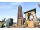 Beautiful rooftop terrace with views of the city skyline and an ornate tower with staircase, perfect for entertaining at 75 Ponce De Leon Ne Ave # 1006, Atlanta, GA 30308
