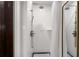 Refreshed Shower showcasing white tile, a modern shower head, and designer door and fixtures at 75 Ponce De Leon Ne Ave # 1006, Atlanta, GA 30308