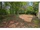 Expansive, private backyard offers ample space for outdoor living and recreation at 288 Old Burnt Hickory Rd, Acworth, GA 30101