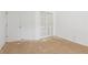Bedroom featuring standard closet doors, bright walls, and unfinished flooring at 288 Old Burnt Hickory Rd, Acworth, GA 30101