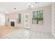 Bright dining area with fireplace and back yard view at 288 Old Burnt Hickory Rd, Acworth, GA 30101