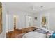Bedroom featuring barn door leading to bath, and access to a spacious closet at 1633 Woodbine Ne Ave, Atlanta, GA 30317
