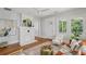 Bright living room features a decorative fireplace, hardwood floors, and natural light at 1633 Woodbine Ne Ave, Atlanta, GA 30317