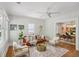 Bright living room featuring hardwood floors, large windows, and contemporary furnishings at 1633 Woodbine Ne Ave, Atlanta, GA 30317