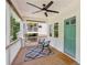 Inviting front porch with seating, ceiling fan, and stylish decor creating a welcoming entrance at 1633 Woodbine Ne Ave, Atlanta, GA 30317