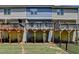 Exterior view of townhomes featuring private balconies and fenced in backyards at 2719 Hedgeway Cir, Kennesaw, GA 30144