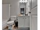 Bright bathroom with a white vanity, framed mirror, and a tub/shower combination at 2719 Hedgeway Cir, Kennesaw, GA 30144