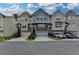 Charming townhome exteriors feature varied colors, stone accents, garages, and landscaped entryways at 2719 Hedgeway Cir, Kennesaw, GA 30144