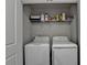 Efficient laundry area equipped with a washer and dryer, maximizing convenience and functionality within the home at 2719 Hedgeway Cir, Kennesaw, GA 30144
