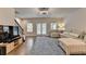 Inviting living area with hardwood floors, neutral walls, comfortable seating, and natural light at 2719 Hedgeway Cir, Kennesaw, GA 30144