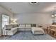 Bright living area with neutral sectional, hardwood floors, modern light fixture, and french door at 2719 Hedgeway Cir, Kennesaw, GA 30144