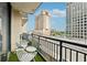 City views from the private balcony with seating, offering a serene outdoor space at 3040 Peachtree Rd, Atlanta, GA 30305