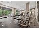 Well-equipped gym with modern exercise machines and natural light, perfect for fitness enthusiasts at 3040 Peachtree Rd, Atlanta, GA 30305
