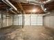 Unfinished basement with two garage doors at 643 Windy Mill Way, Temple, GA 30179