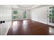 Spacious bedroom with hardwood floors, large windows, and modern design at 643 Windy Mill Way, Temple, GA 30179