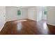 Bright bedroom featuring hardwood floors, a window and neutral paint color at 643 Windy Mill Way, Temple, GA 30179