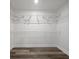 Walk-in closet with hardwood floors and metal shelving at 643 Windy Mill Way, Temple, GA 30179
