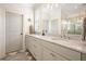 Bathroom with a marble countertop and checkerboard floors at 6930 Wesley Hughes Rd, Cumming, GA 30040