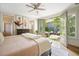 Bedroom featuring double doors leading to a patio area at 6930 Wesley Hughes Rd, Cumming, GA 30040