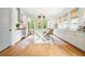 Gourmet kitchen with ample counter space, modern appliances, and an island perfect for entertaining at 6930 Wesley Hughes Rd, Cumming, GA 30040