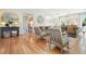 Well-lit living room with hardwood floors, stylish decor, and comfortable seating creates an inviting space at 6930 Wesley Hughes Rd, Cumming, GA 30040
