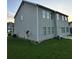 Spacious backyard with a well-maintained lawn and ample room for outdoor activities at 7703 Hansel Ln, Lithonia, GA 30058