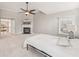 Bright main bedroom with vaulted ceiling, ceiling fan, and carpeted floor at 3887 Hickory Manor Dr, Suwanee, GA 30024