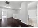 Upstairs living space with hardwood floors and a full bathroom at 5590 Bright Cross Way, Suwanee, GA 30024