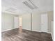 Updated basement area featuring gray flooring, painted walls, and two doors at 73 Azalea Dr, Villa Rica, GA 30180
