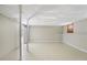 A spacious unfinished basement with concrete floor and white walls ready for customization at 73 Azalea Dr, Villa Rica, GA 30180