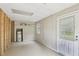 A utilitarian basement area featuring a water heater, pegboard, and exterior door at 73 Azalea Dr, Villa Rica, GA 30180