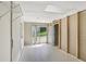 A utilitarian basement area featuring a sliding glass door and unfinished drywall at 73 Azalea Dr, Villa Rica, GA 30180