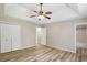 Spacious bedroom with tray ceilings, ceiling fan and ensuite at 73 Azalea Dr, Villa Rica, GA 30180