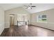 Bright and airy living room featuring updated flooring, fresh paint, and ample natural light at 73 Azalea Dr, Villa Rica, GA 30180