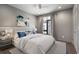 Stylish bedroom boasts a comfortable bed, modern decor, and ample natural light for a relaxing retreat at 133 City View Ne Ct, Atlanta, GA 30308