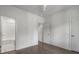 Spacious bedroom with hardwood floors leading to a bathroom and closet provides comfort and functionality at 133 City View Ne Ct, Atlanta, GA 30308