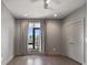 This bedroom has wood floors, a ceiling fan, and nice natural light, creating a comfortable and inviting space at 133 City View Ne Ct, Atlanta, GA 30308