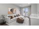 Cozy living room featuring modern decor, hardwood floors, and natural light from the French doors at 133 City View Ne Ct, Atlanta, GA 30308