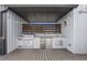 Outdoor kitchen featuring a grill, granite countertop, and stainless steel fridge on a deck at 133 City View Ne Ct, Atlanta, GA 30308