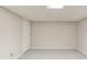 Finished basement featuring neutral paint and plush gray carpeting at 1900 Tribble Ridge Dr, Lawrenceville, GA 30045