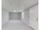 Spacious basement area featuring neutral paint, new carpet and a window for natural light at 1900 Tribble Ridge Dr, Lawrenceville, GA 30045