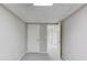 Bedroom with neutral walls and carpet, featuring standard white doors at 1900 Tribble Ridge Dr, Lawrenceville, GA 30045