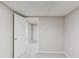 Bedroom with neutral colored walls and carpet, standard white doors open to other rooms at 1900 Tribble Ridge Dr, Lawrenceville, GA 30045