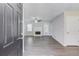 Inviting living room with wood flooring, ceiling fan, and door to outdoor area at 1900 Tribble Ridge Dr, Lawrenceville, GA 30045