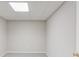 Neutral colored room with a standard white door and neutral carpet at 1900 Tribble Ridge Dr, Lawrenceville, GA 30045