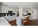 Kitchen featuring granite countertops, stainless steel appliances, and gray cabinets at 3675 Ridgeway Ter, Suwanee, GA 30024